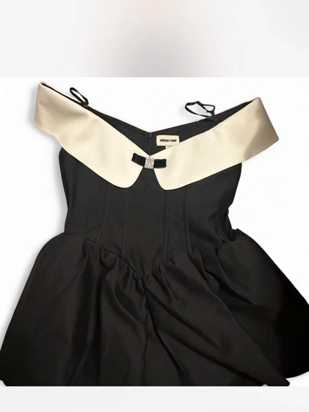 Off-Shoulder Black & White Mini Dress with Bow Detail - Picture 2 of 3